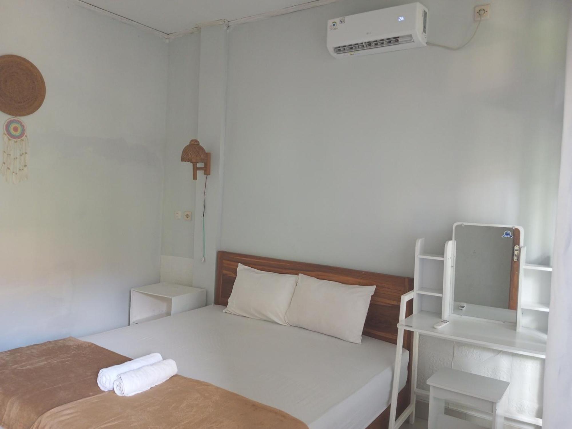 Kri Homestay Kuta  Rum bild