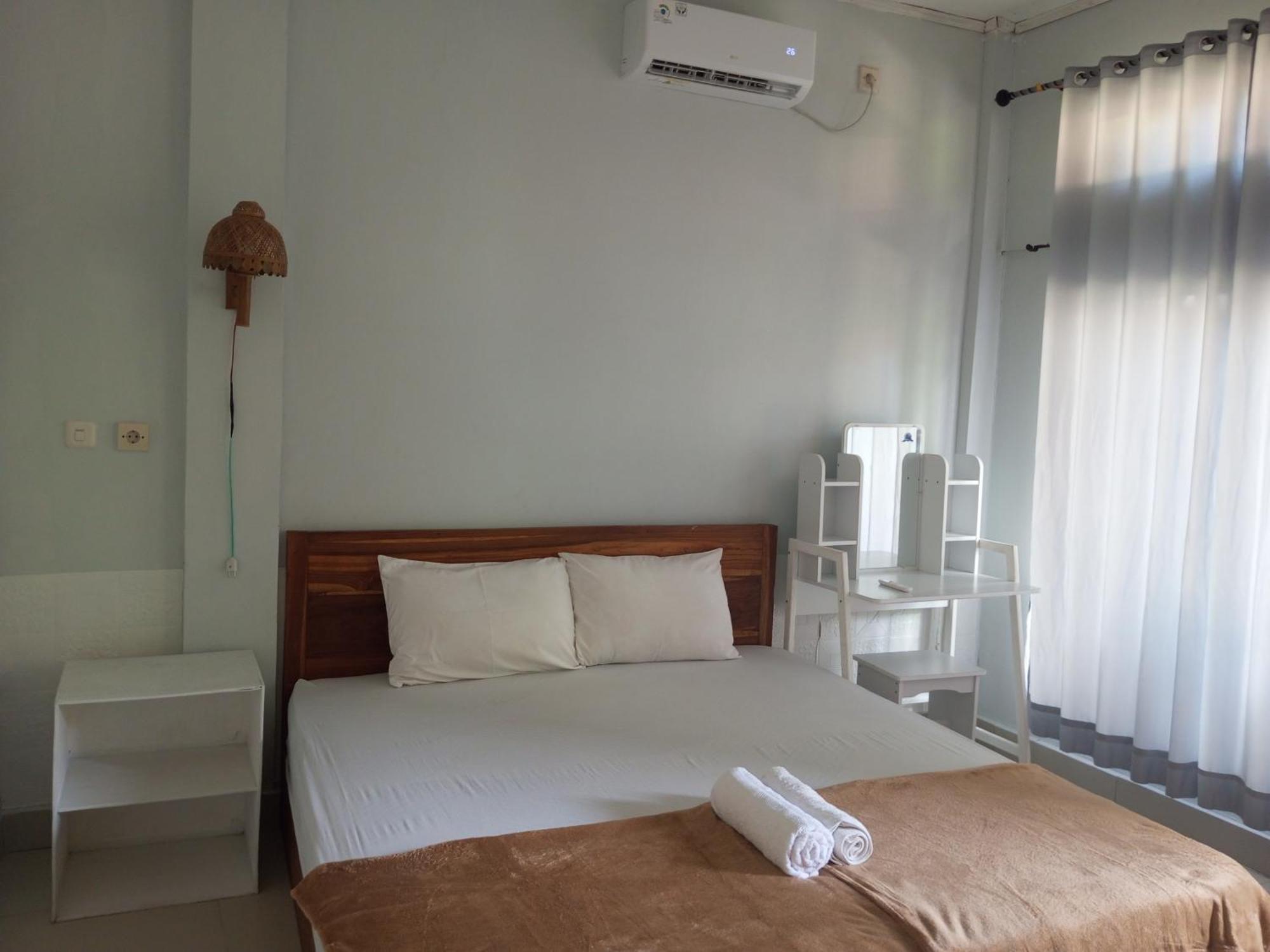 Kri Homestay Kuta  Rum bild